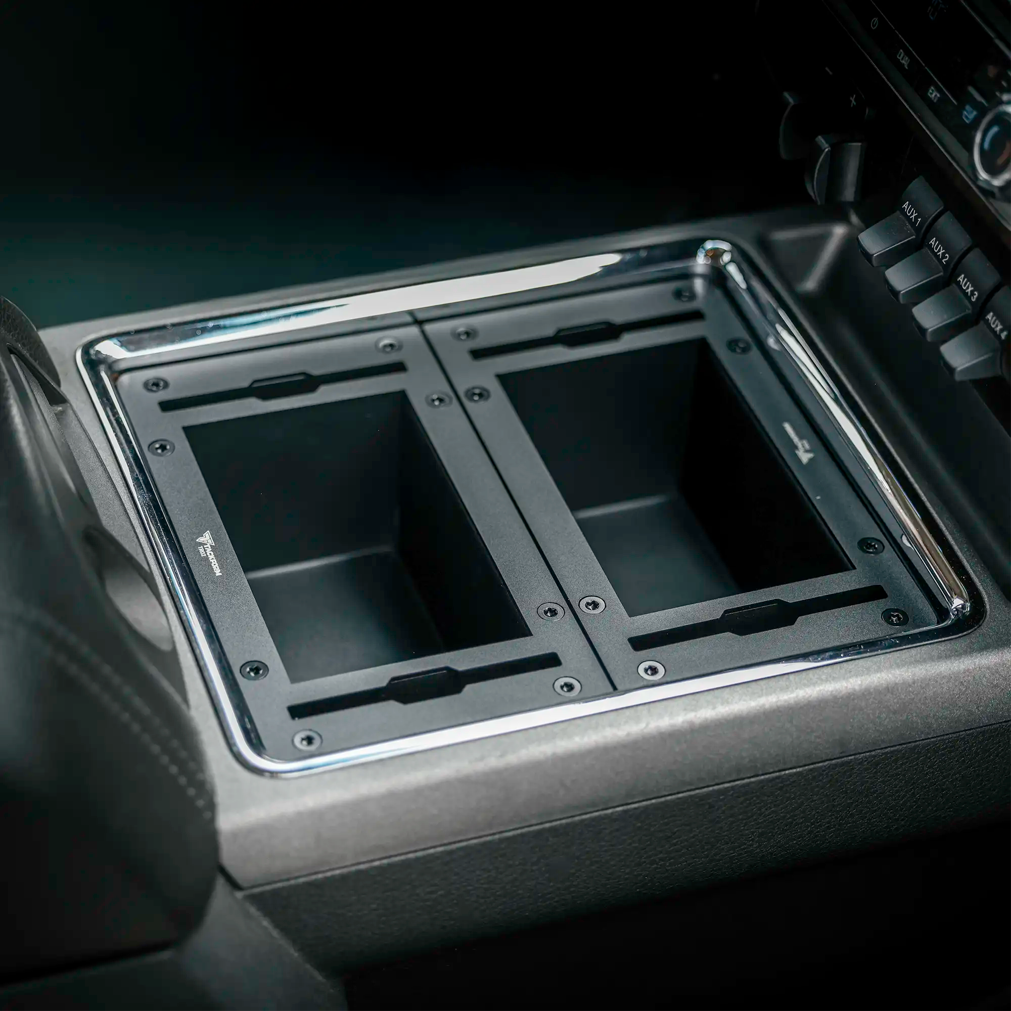 dual device mount brackets installed in the center console of a 2011-2016 ford super duty
