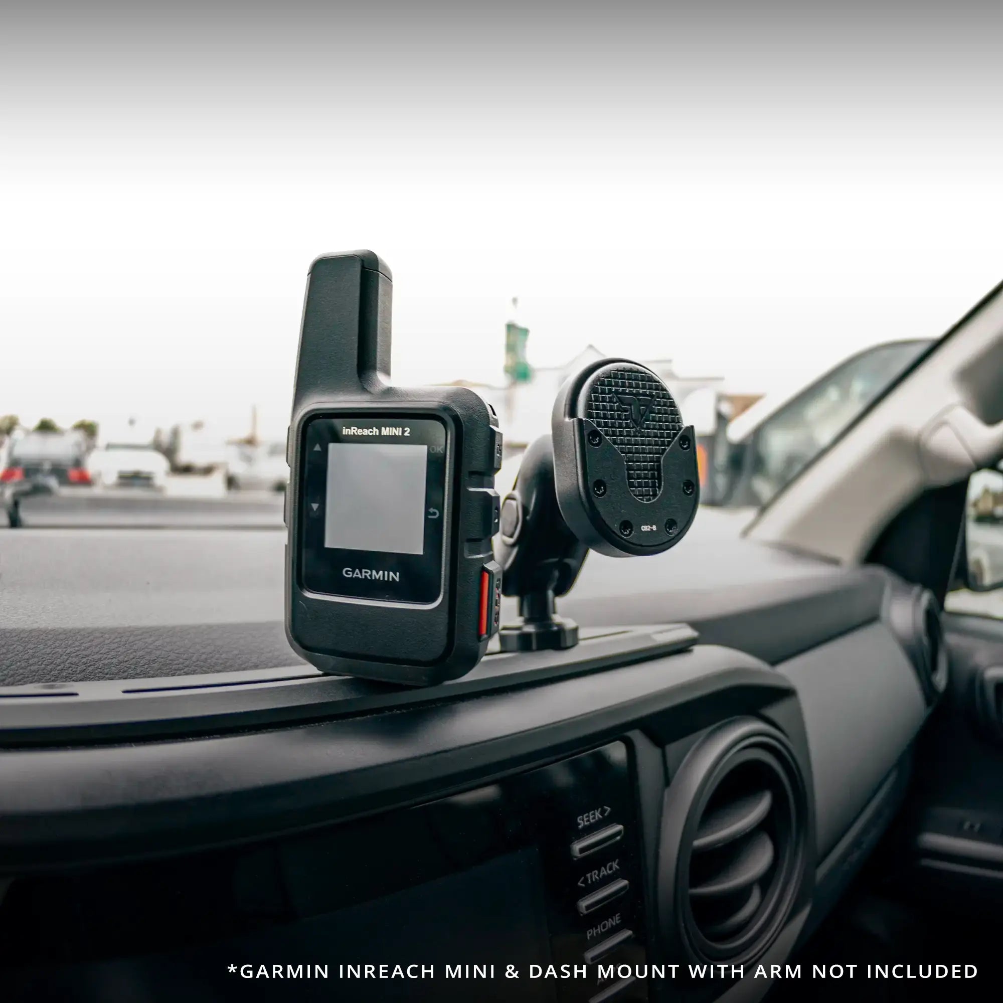 Tackform Garmin InReach Mini Spring-Loaded Mount with 20mm Metal Ball installed in a 3rd Gen Toyota Tacoma